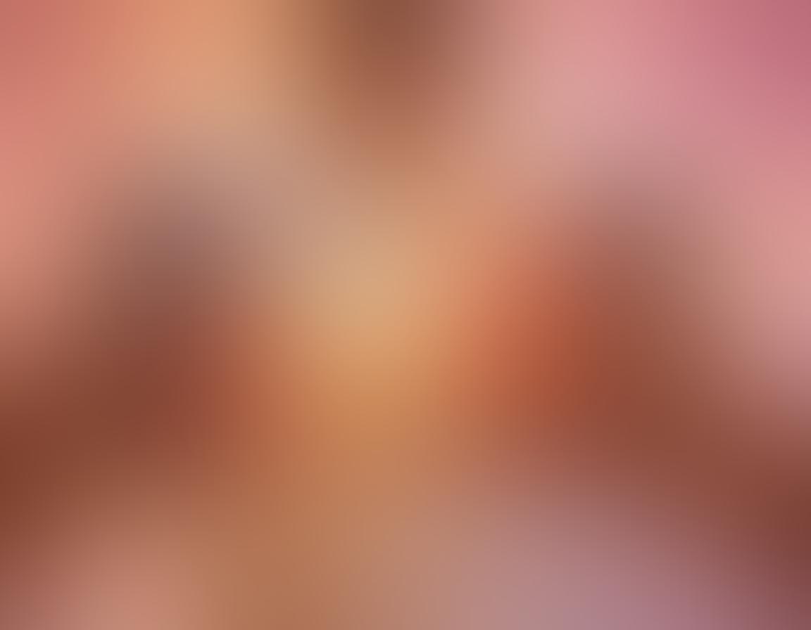 A close-up of diverse hands connecting through a glowing smartphone screen, symbolizing intimacy in the digital age. In the background, soft hues of warm colors represent affection and relationships. Include hints of social media icons subtly integrated into the design, radiating warmth and connection. The overall atmosphere should evoke a sense of closeness and modern technology. vibrant colors. super-realistic.